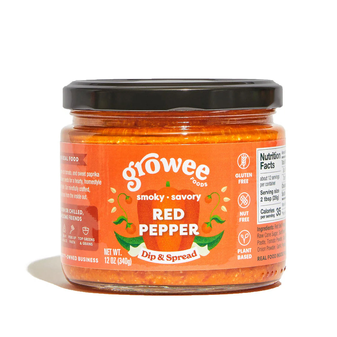 Jar of growee red pepper dip on a white background