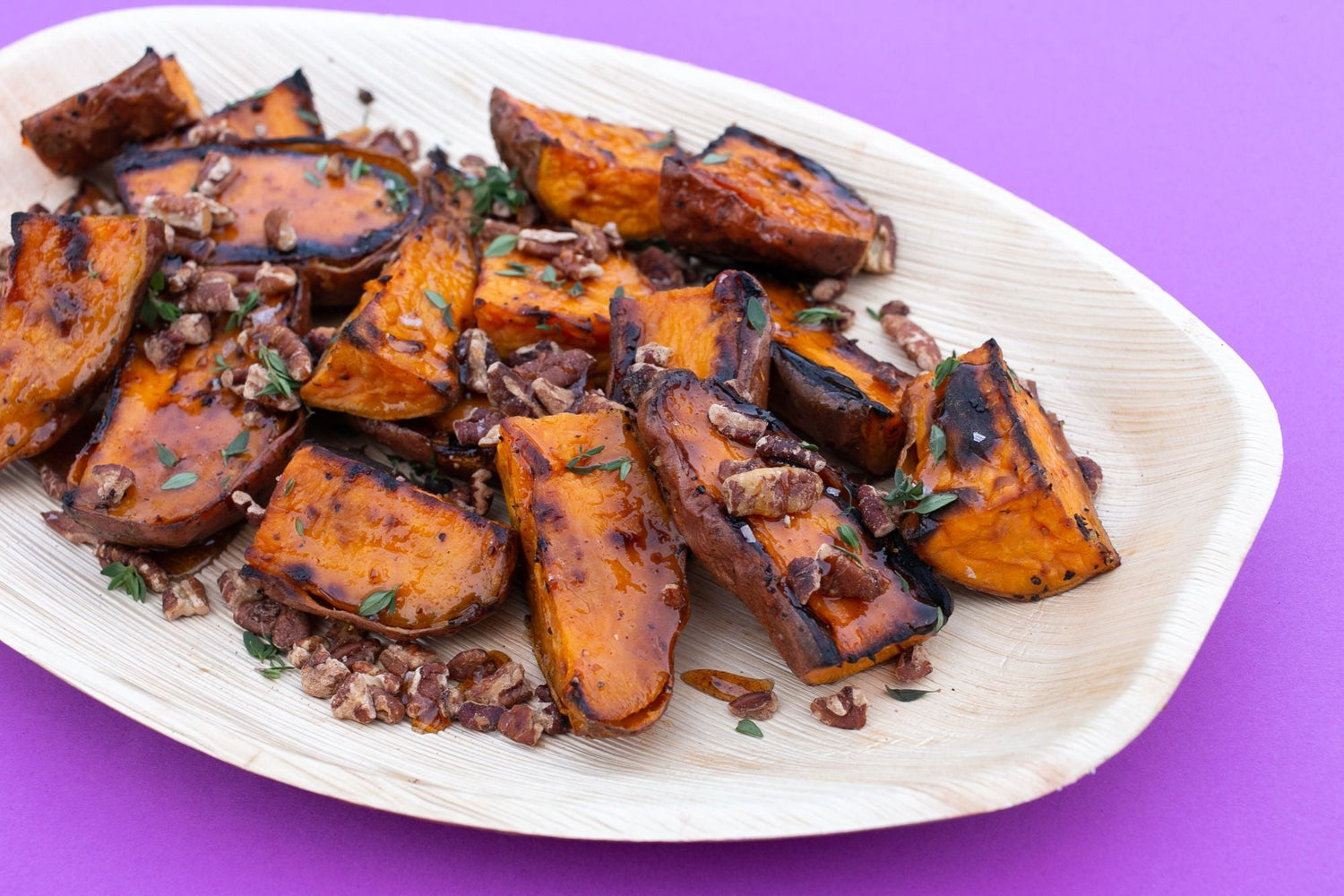 Charred Sweet Potatoes with harissa honey