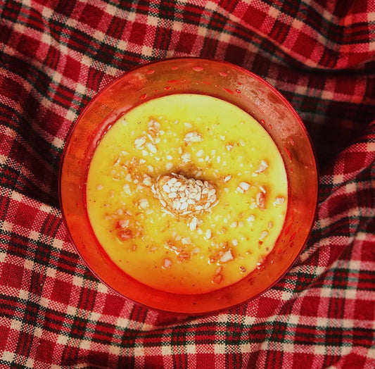 Golden Milk Panna Cotta with Cardamom Honey Bourbon Sauce