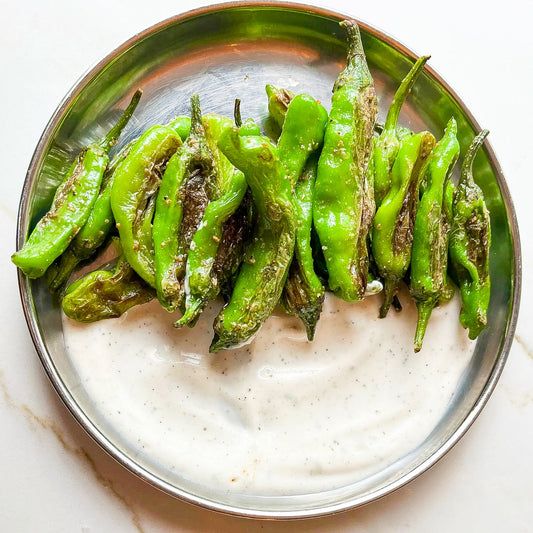 Blistered Shishitos with Black Pepper Lime Yogurt