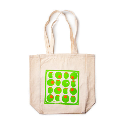 Beige tote bag with green and red pattern on a white background