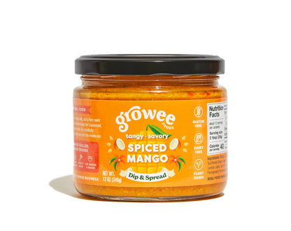 Jar of growee spiced mango dip and spread on a white background