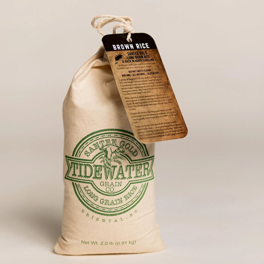 Bag of Widewater Grain brown rice with a tag on a beige background